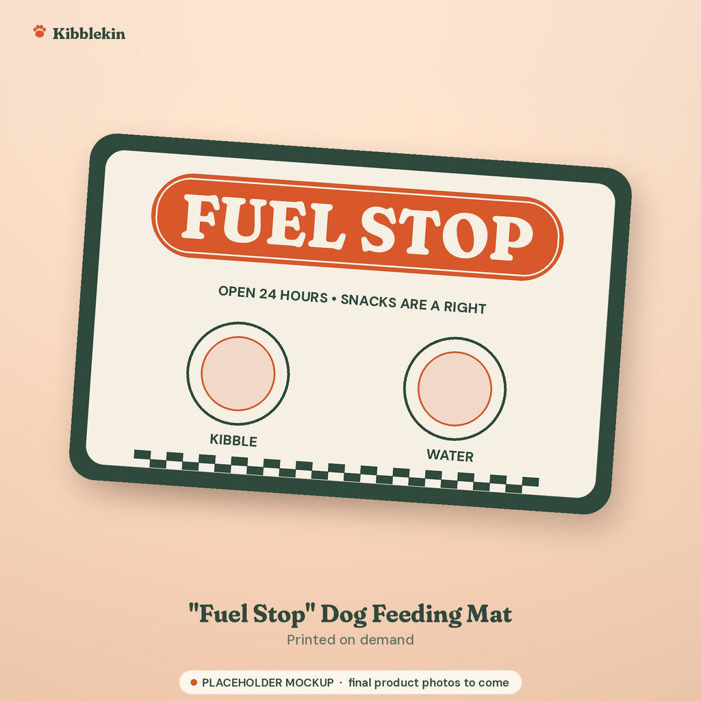Placeholder mockup (not a final Printify product photo): printed dog feeding mat with a retro FUEL STOP sign, the line OPEN 24 HOURS, SNACKS ARE A RIGHT, two bowl circles labeled KIBBLE and WATER, and a checkered strip along the bottom